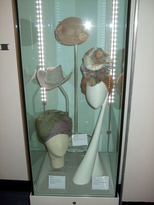 Fitting more hats on display! The final look of the case showing Jane Fryer, 
