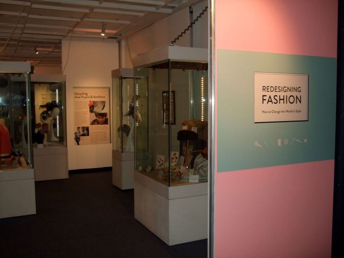 The start of the exhibition, leading to cases which display objects from the museum collection and the loans from the Manchester Gallery of Costume
